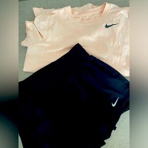 Peach style dry fit Nike -T no stains. And Black Nike dry fit shorts.